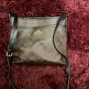 Brown leather monogram Coach Crossbody.